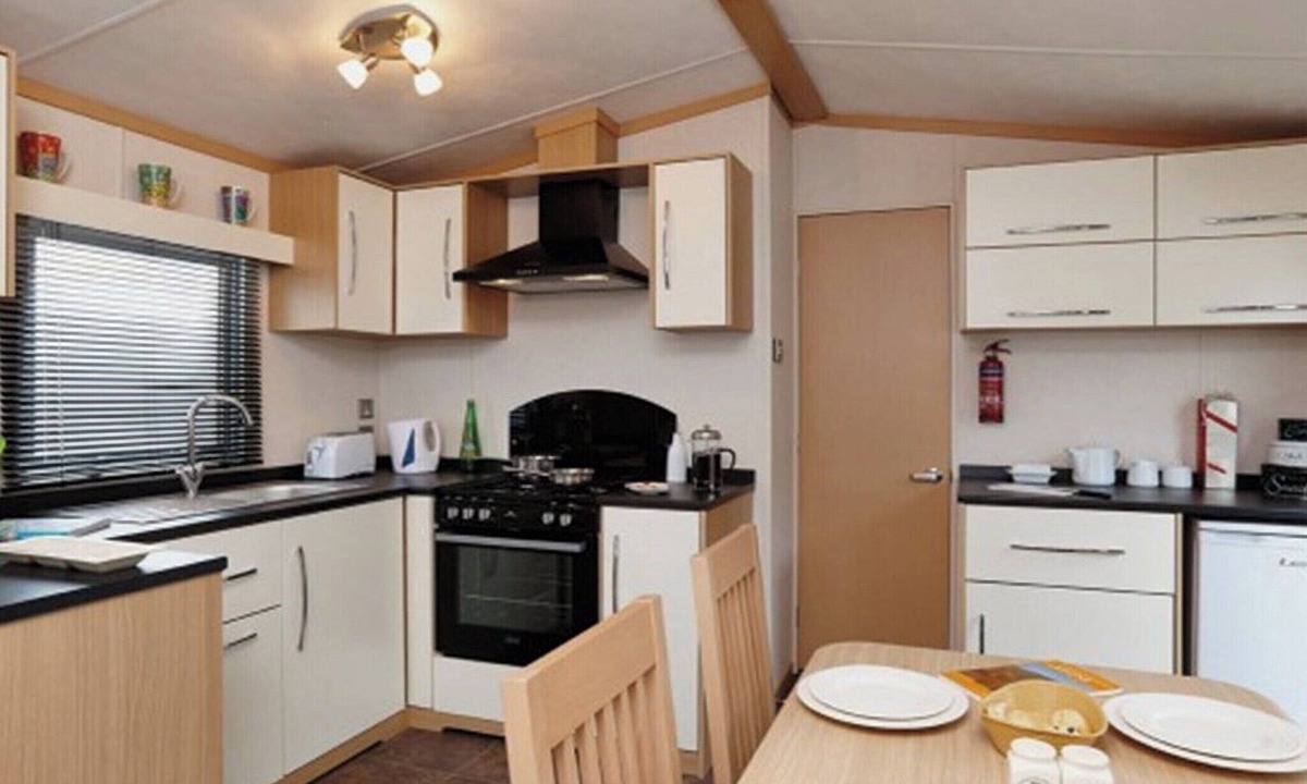 Wigton House | 12ft-wide caravan with one double and two twin.