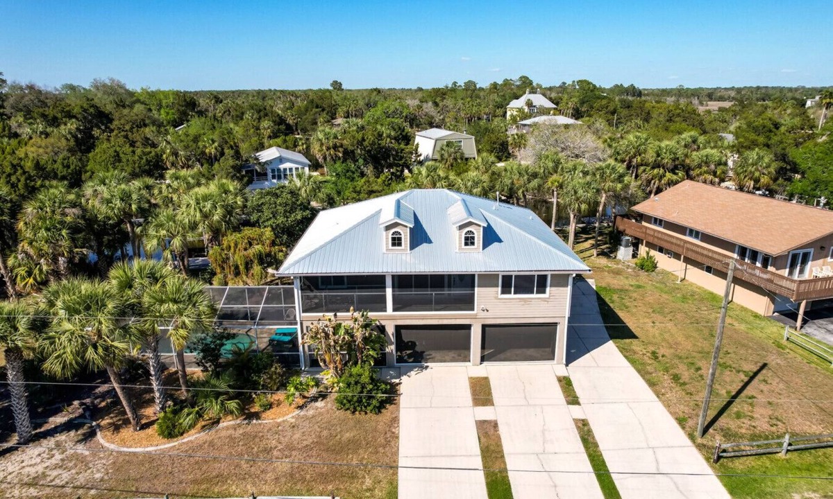 Woods N Waters House | Canal Front|Screened Pool|Dock|Firepit|Dog OK|Sleeps 9