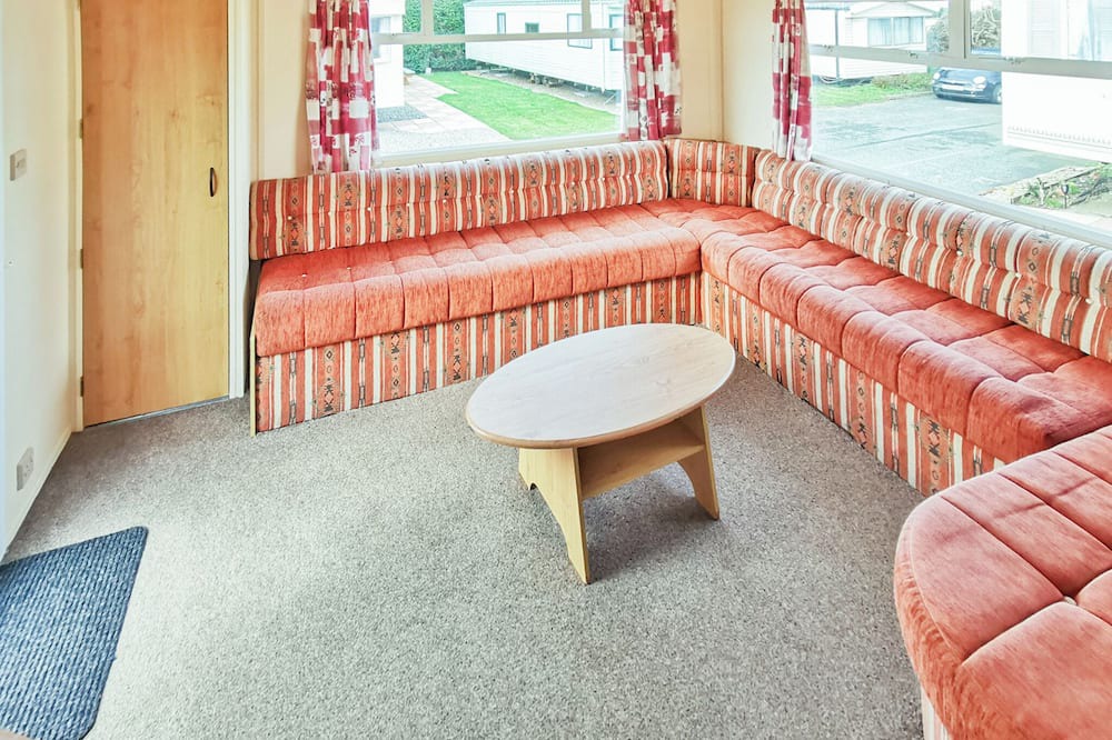Fishguard House | Comfortable caravan with one double and two twin.