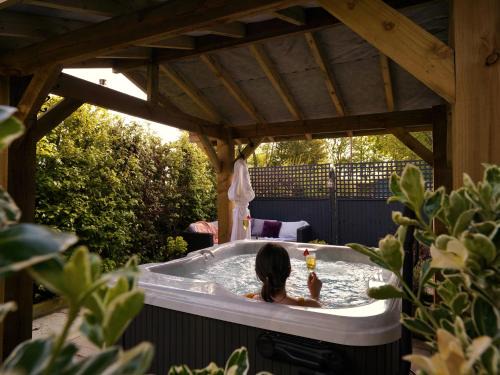 Workington House | Scenery Hill Hideaways The Coach House Charming Retreat with Jacuzzi and BBQ Hut Near the Lake District