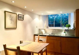 Central Mezzanine Apartment in Historic School