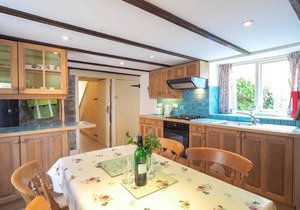 Spacious cottage in the heart of St Davids overlooking cathedral with parking .