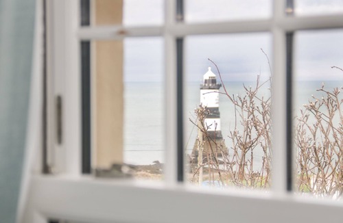 Penmon Cottage | 2 OLD COASTGUARD HOUSE, pet friendly, with open fire in Beaumaris