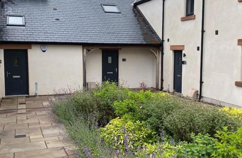 Wing House | 8 Tarn End Cottage, a luxurious cottage for romantic break overlooking Talkin Tarn close to Hadrians Wall