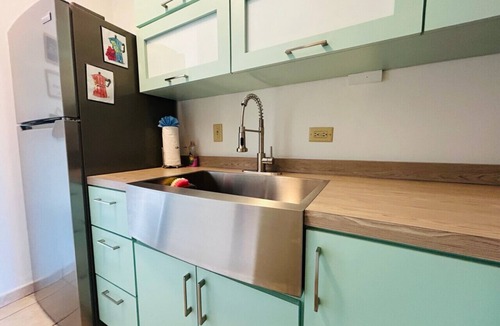 Stella Apartment | Beachfront Petite Paradise unit at Pelican Reef 103
