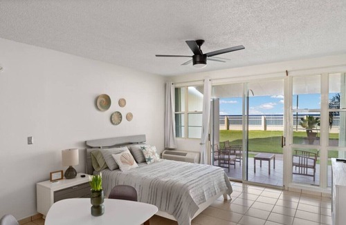 Stella Apartment | Beachfront Petite Paradise unit at Pelican Reef 103