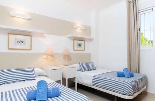 Cumbre del Sol Apartment | Beautiful apartment for 4 guests with pool, A/C, WIFI, TV, patio and parking