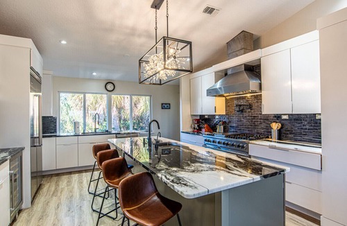 Woods N Waters House | Canal Front|Screened Pool|Dock|Firepit|Dog OK|Sleeps 9