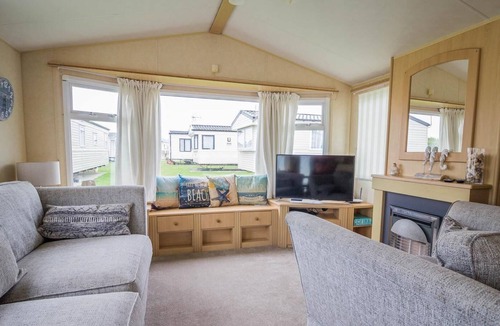 Clacton-on-Sea House | Caravan with decking and free WiFi at Seawick Holiday Park ref 27359S
