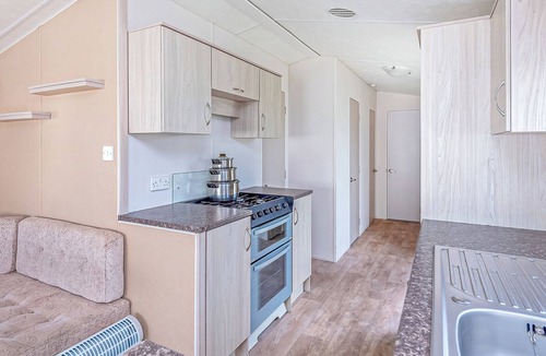 Prestatyn House | Caravan with one double and two twin.