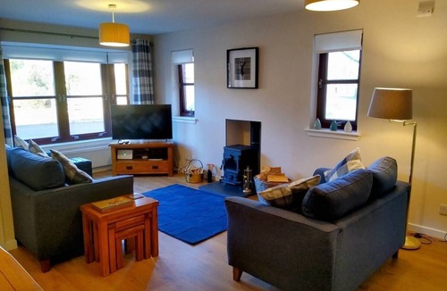 Aviemore Apartment | Charming two-bedroom pet friendly property with fire