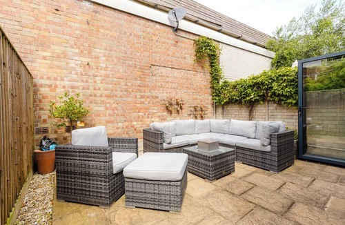 Sands End Apartment | Chic 2BDR Flat in Fulham with Patio