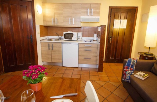 Robregordo Apartment | Comfortable bedroom apartment and sofa bed on the ground floor with fireplace