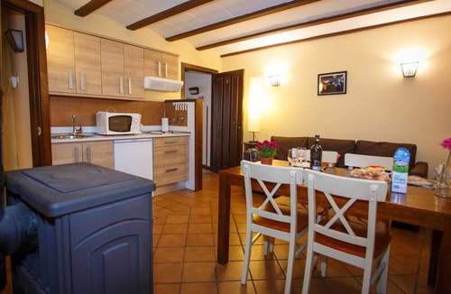 Robregordo Apartment | Comfortable bedroom apartment and sofa bed on the ground floor with fireplace