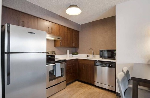 Reno/Tahoe Airport Hotel | Convenient Location! Unit w/Full Kitchen, Outdoor Pool, Free Breakfast!