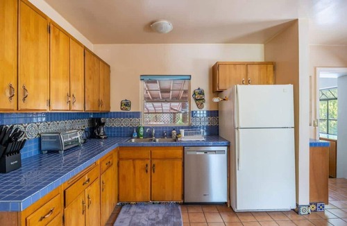 West University House | Cozy 2BR Home Near UNR with Large Deck & Parking