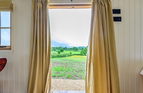 Sherborne Cabin | Hintock, featuring an outdoor bath, in Leigh, Dorset.