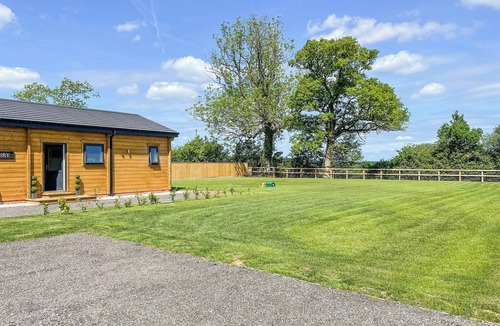 Pattiswick Cottage | Indulge and delight at this wonderful lodge, with your own private hot tub.