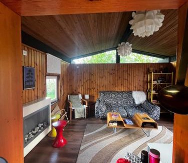 Cenarth Ski Chalet | Lush 1970s Scandi-inspired Welsh woodland cabin