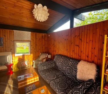 Cenarth Ski Chalet | Lush 1970s Scandi-inspired Welsh woodland cabin