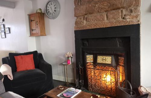 Gosforth House | Mill Cottage modern cosy Lake District home with open fire near Scafell