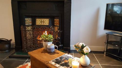 Gosforth House | Mill Cottage modern cosy Lake District home with open fire near Scafell