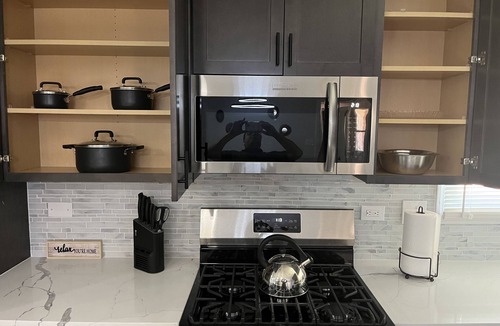 Wheaton House | Modern Open Concept Home with Pool Table by Train Station