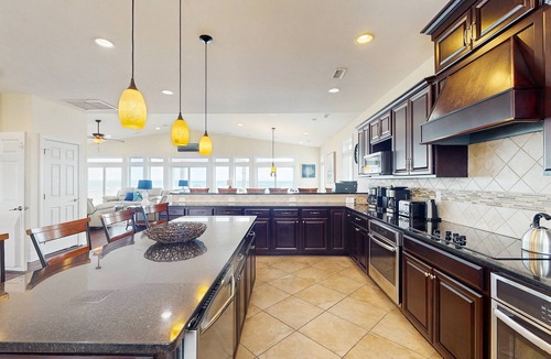 Surf City House | Oceanfront estate - heated pool, pool spa, elevator, pool table & chef's kitchen