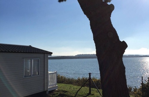 Hamworthy House | Orchid - dog friendly with sea view on Rockley Park, Poole