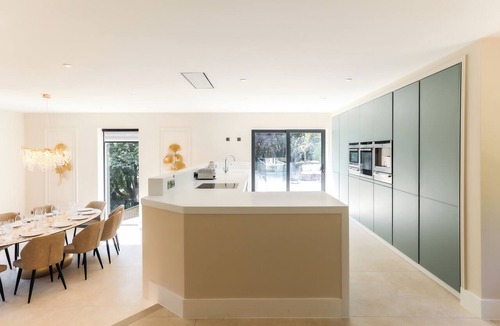 Matlock Bath House | Perched above Matlock Bath, 37 Steps is a stylish upside-down home designed to make the most of its incredible views across the valley. With a sociable open-plan living space, four ensuite bedrooms, and a showstopping terrace with hot tub.