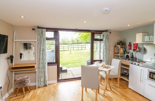 Wimborne Cottage | PHEASANT LODGE, romantic, with hot tub in Wimborne Minster