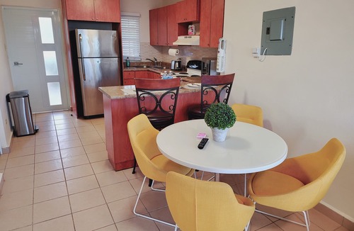 Bucana Apartment | Private Jacuzzi Oasis with Mountain Views. FREE Parking and Laundry