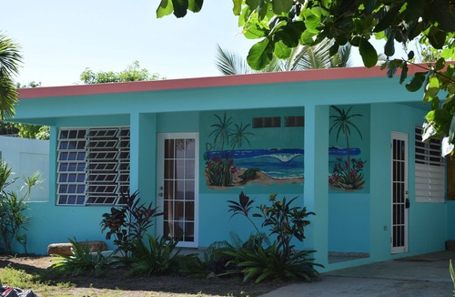Hatillo House | Relaxed Oceanfront home on quiet palm fringed Beach with large Oceanfront patio