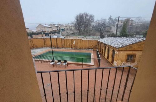 Alfacar House | Rustic and cozy room with private bathroom, double bed and garden view.