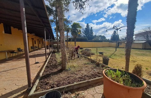 Alfacar House | Rustic and cozy room with private bathroom, double bed and garden view.