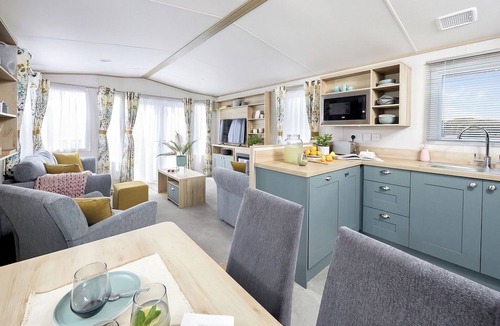 Narberth House | Stylish and spacious 12ft-wide caravan with one double and two twin.