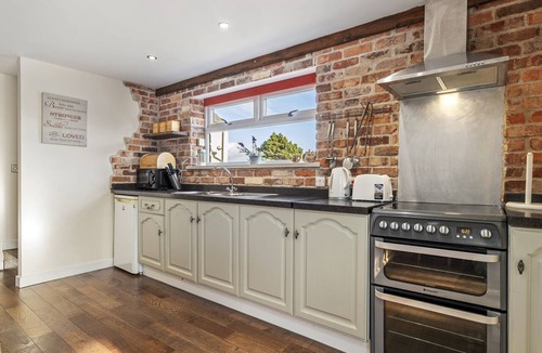 Llangynin Cottage | This converted barn with hot tub offers the perfect rural escape