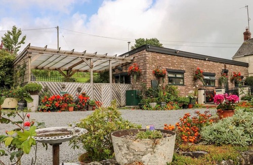 Llangynin Cottage | This converted barn with hot tub offers the perfect rural escape