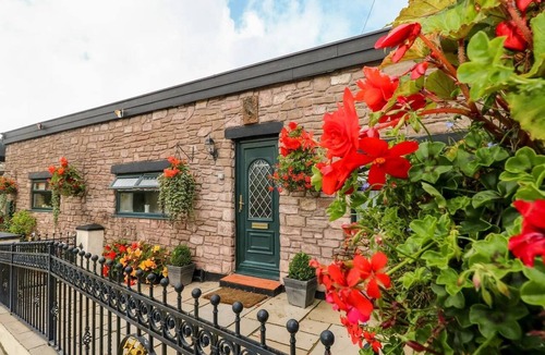 Llangynin Cottage | This converted barn with hot tub offers the perfect rural escape