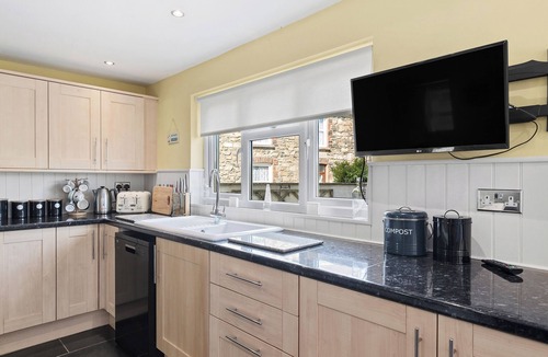 Haverfordwest Cottage | This spacious family home with glorious wood burner has all year round charm.