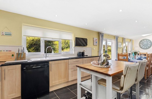 Haverfordwest Cottage | This spacious family home with glorious wood burner has all year round charm.