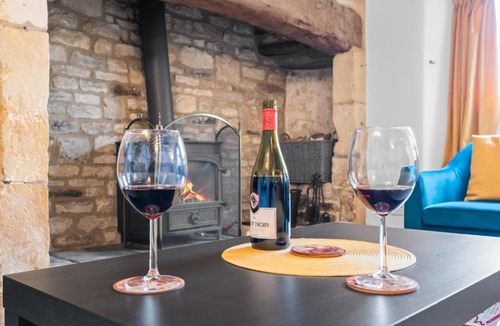 Cutsdean House | Traditional Cotswold escape with garden and fireplace