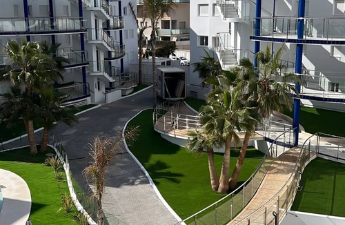 San Antonio Bay Apartment | Upscale 3 bedroom front line sea with sunset view