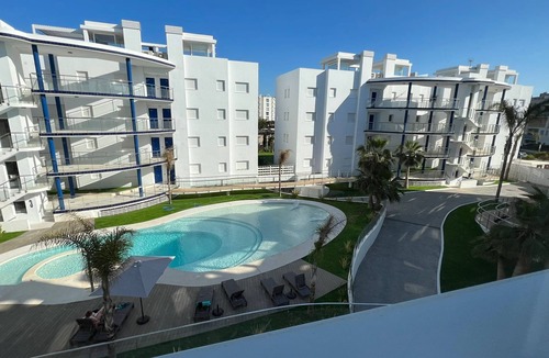 San Antonio Bay Apartment | Upscale 3 bedroom front line sea with sunset view