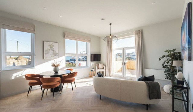 A luxury ground-floor apartment, offering stunning coastal views for up to 4 guests
