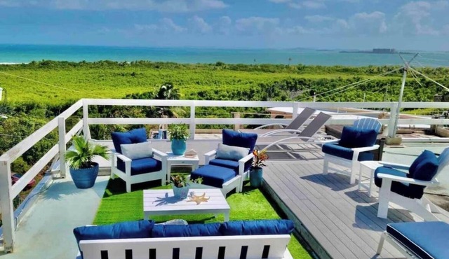"Comfortable, modernized 5BR 4BA Home with an amazing Ocean View and breeze!