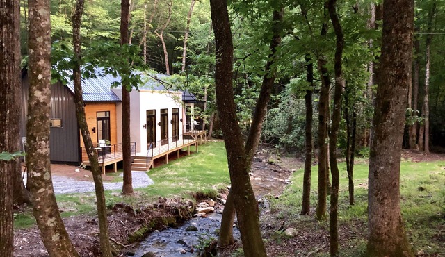 E Ranch is a modern, creek side, Scandinavian barnhouse.