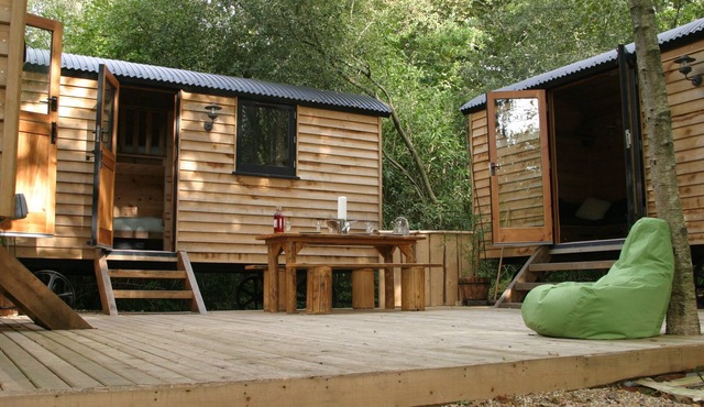 Exciting handbuilt wooden shepherd hut cluster with hot tub