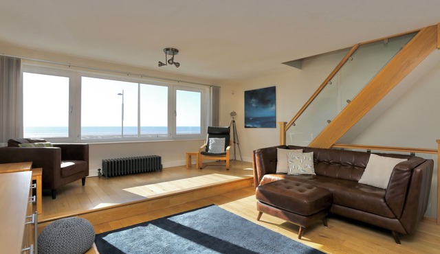 Fabulous beachfront 3 bed house with parking