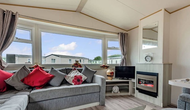 Gold Caravan with decking
